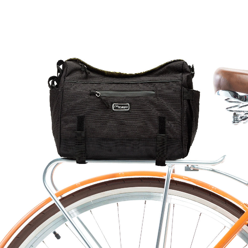 Black bicycle bag attached to a bicycle with a white background