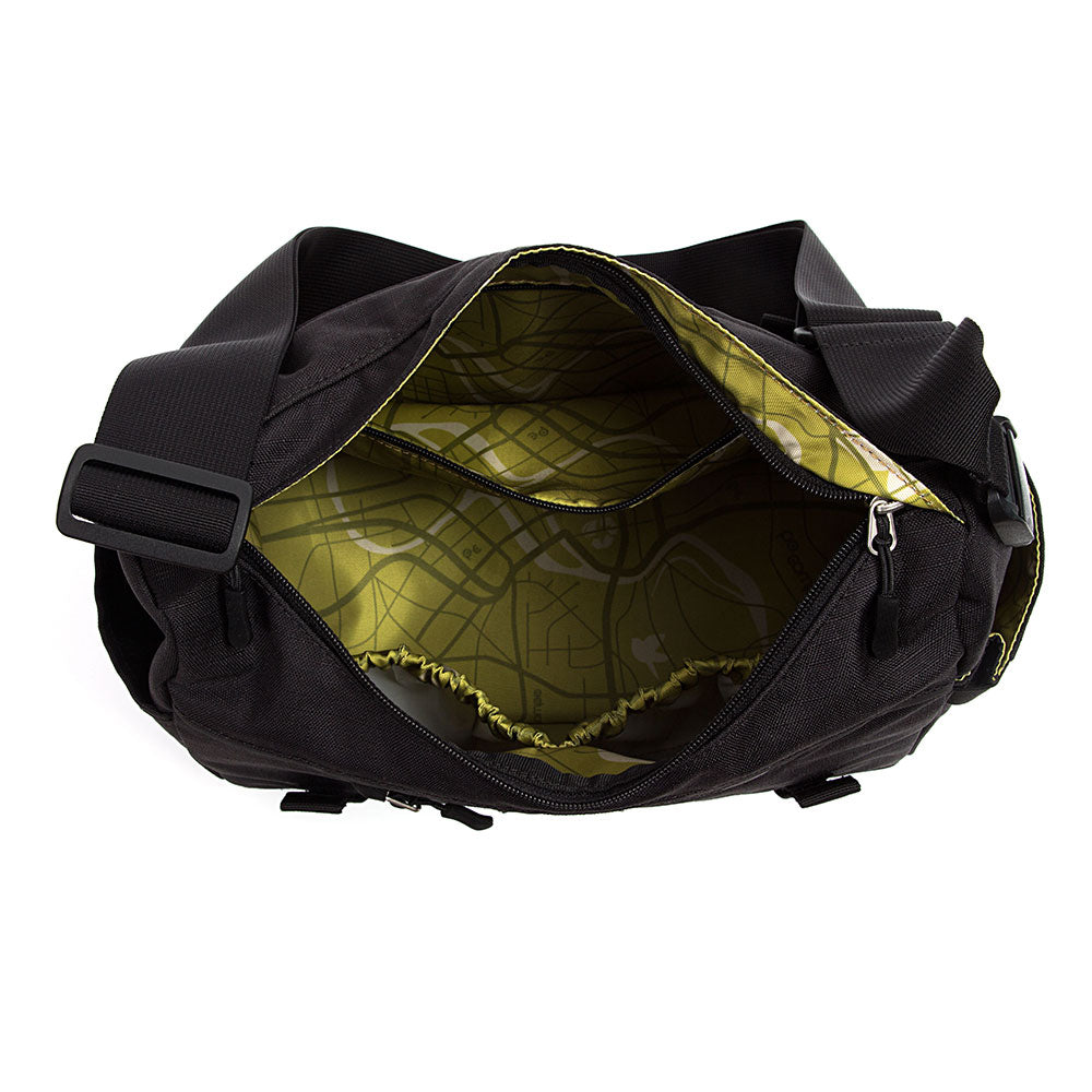 Black trunk bag with green interior on a white background
