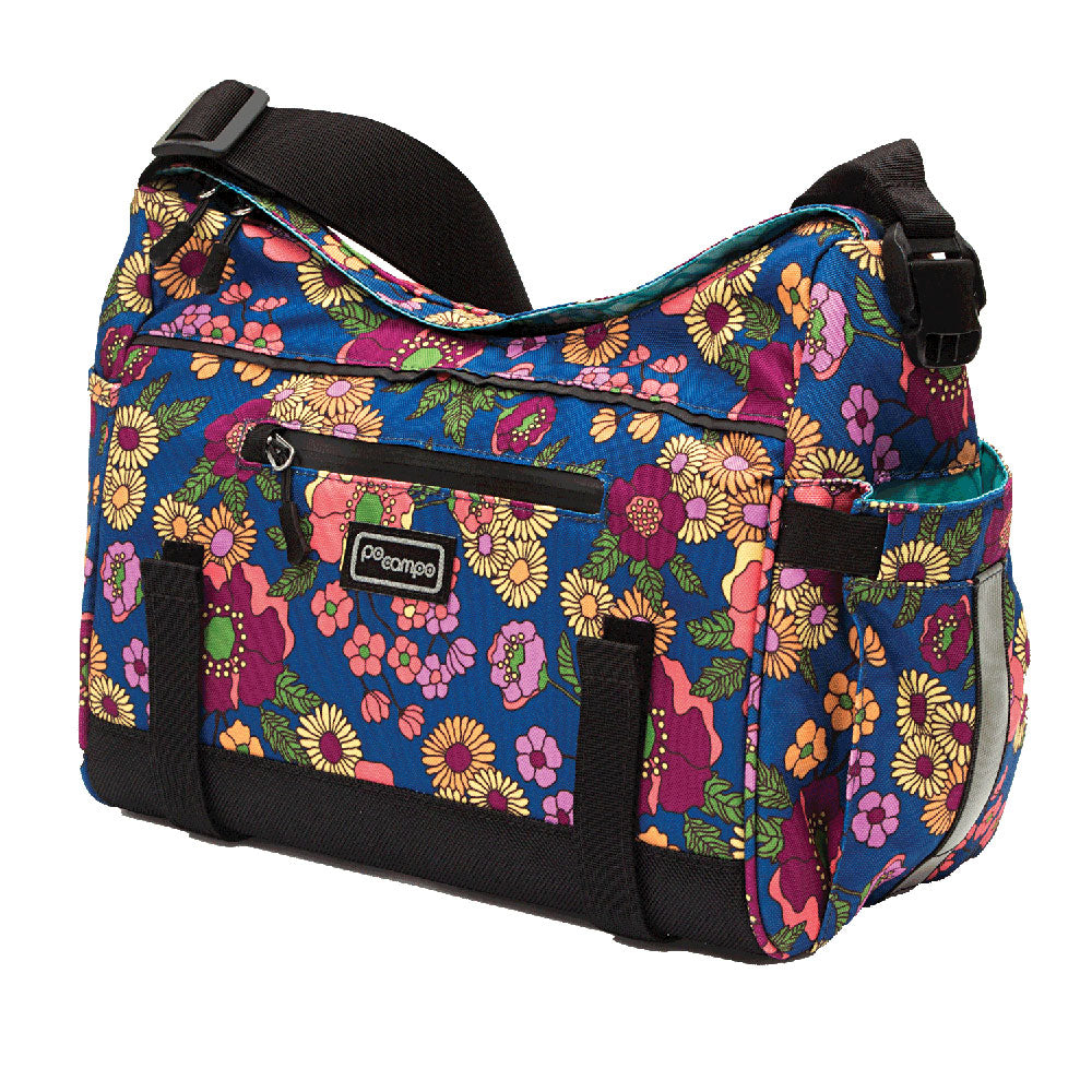 Floral-patterned Meadows Po Campo trunk bike bag with a visible logo on a white background