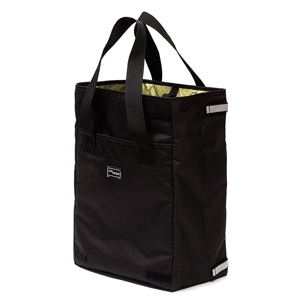Black Po Campo grocery pannier with a visible brand logo on a white background