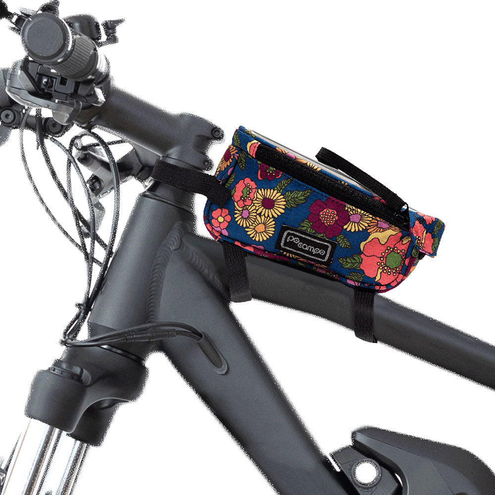 Floral-patterned bike phone bag attached to a bicycle frame.