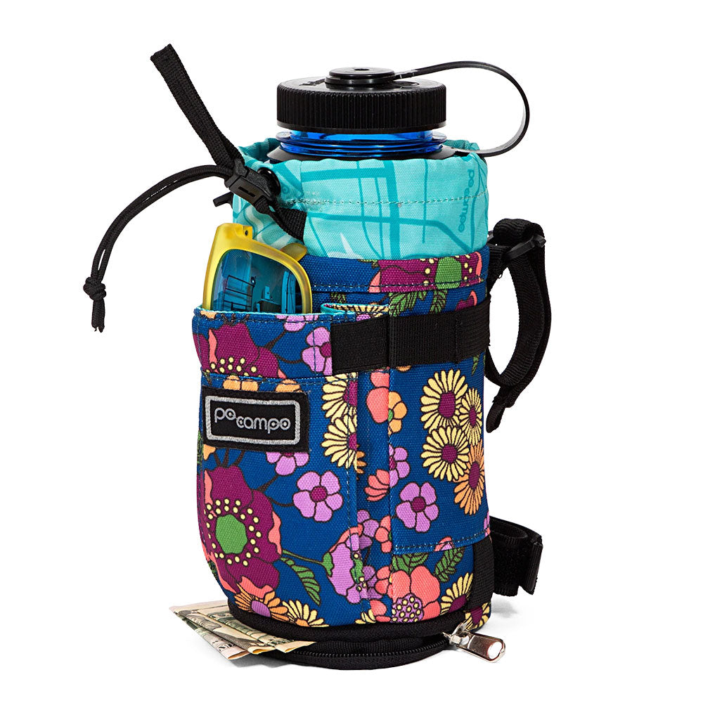 Floral-patterned water bottle holder with a blue water bottle on a white background.