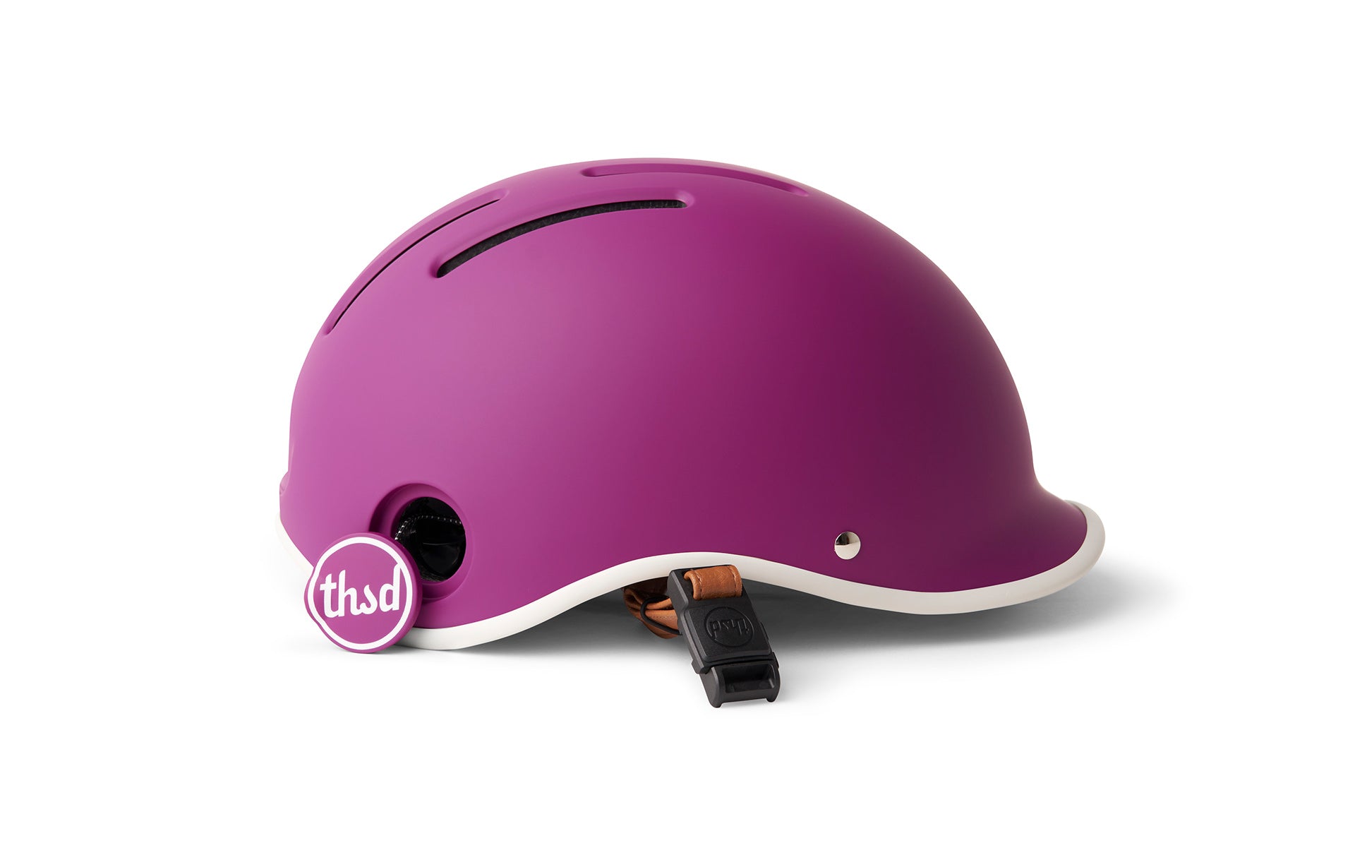 Purple helmet showing locking hole on a white background