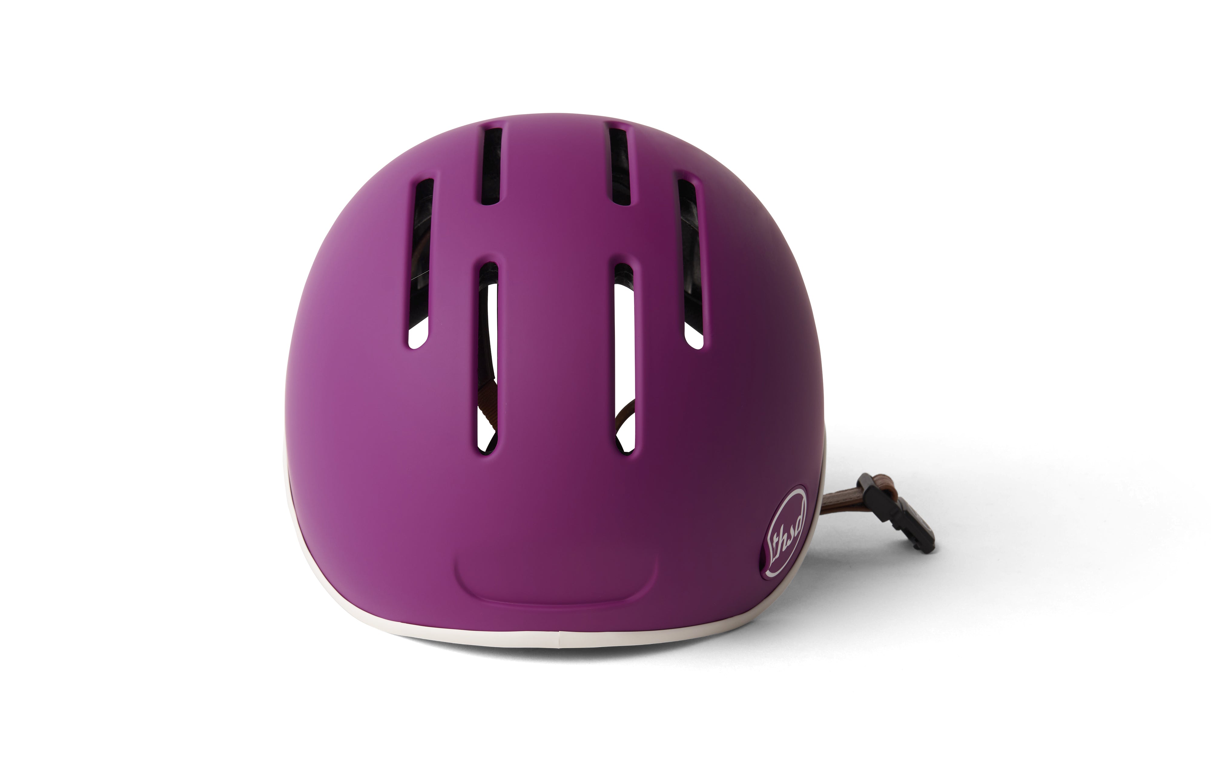 Purple helmet showing ventilation on a white background