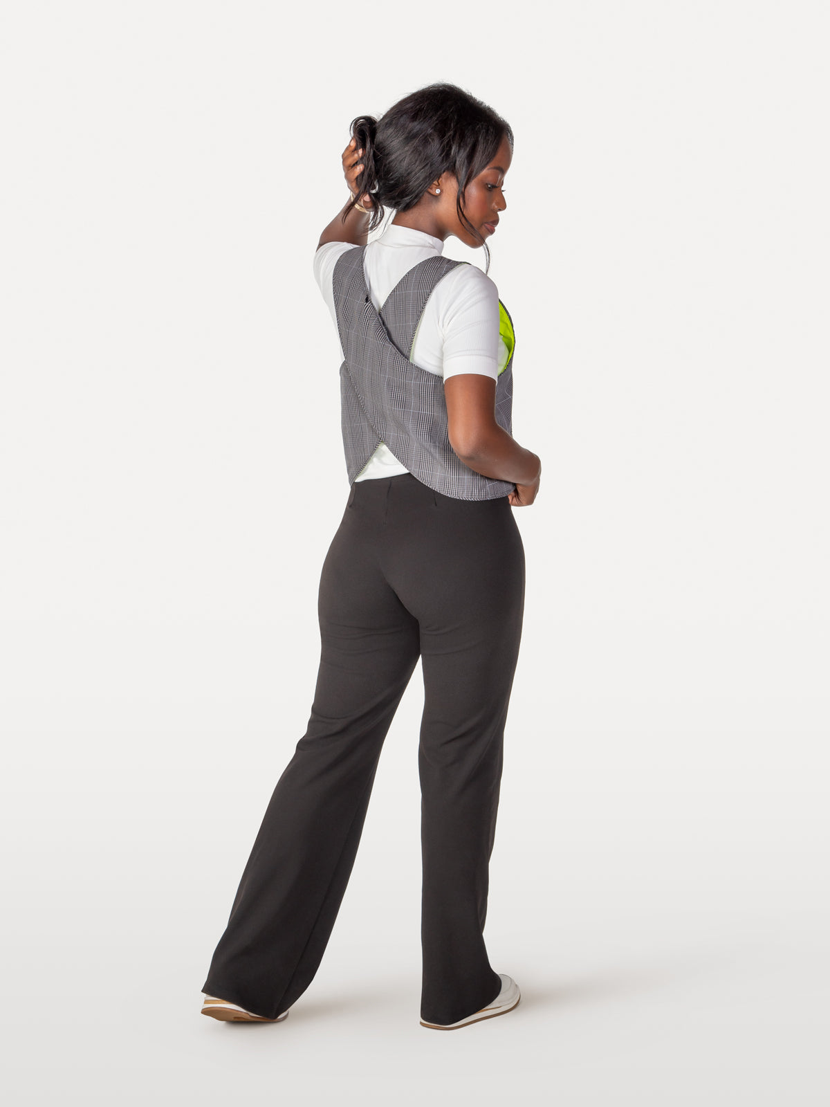 Reverse crisscross vest has reflective thread for night visibility