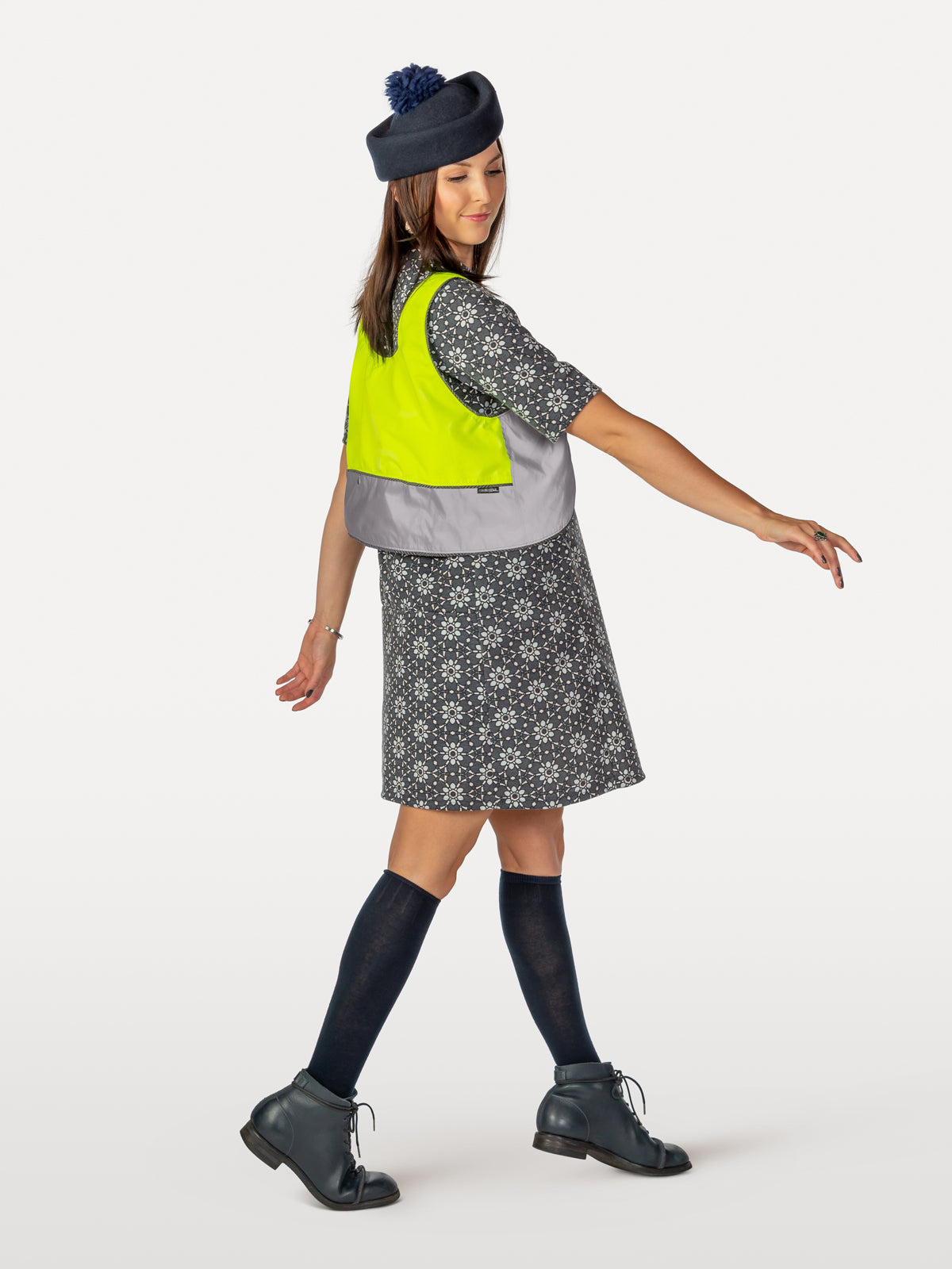 C the people cycling dress with hi-vis reflective vest in style