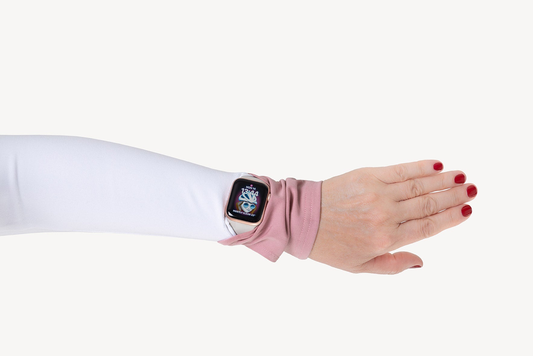Smartwatch on a wrist with a pink sleeve against a white background