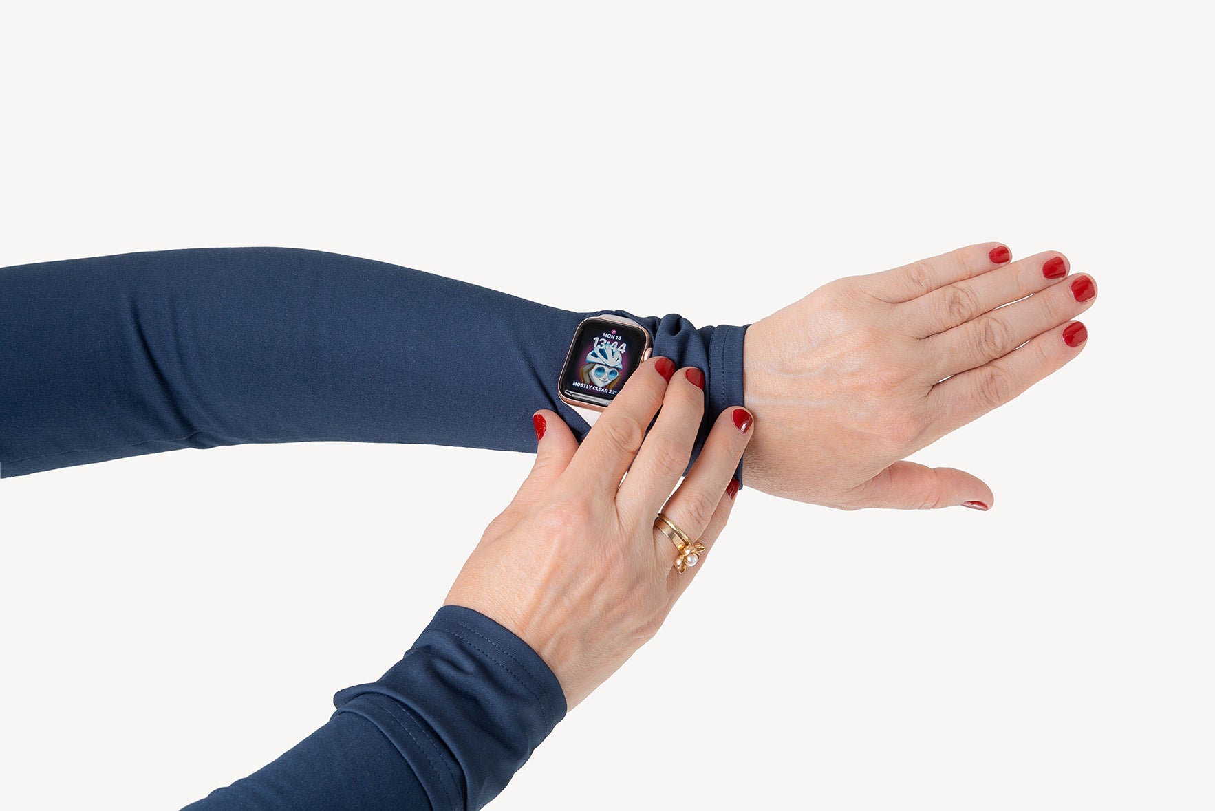 Smartwatch as seen through a slit in a blue arm warmer