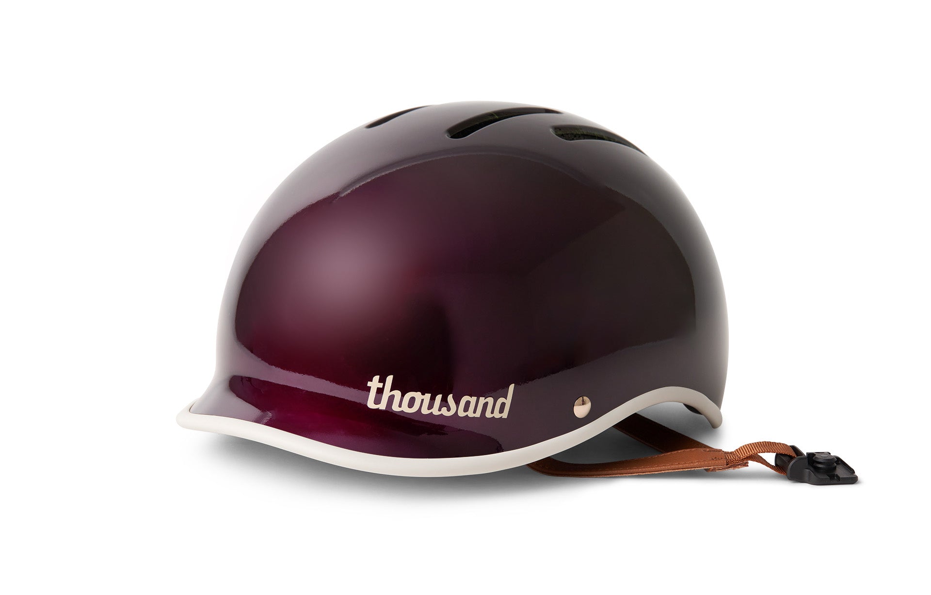 Purple helmet with 'thousand' branding on a white background