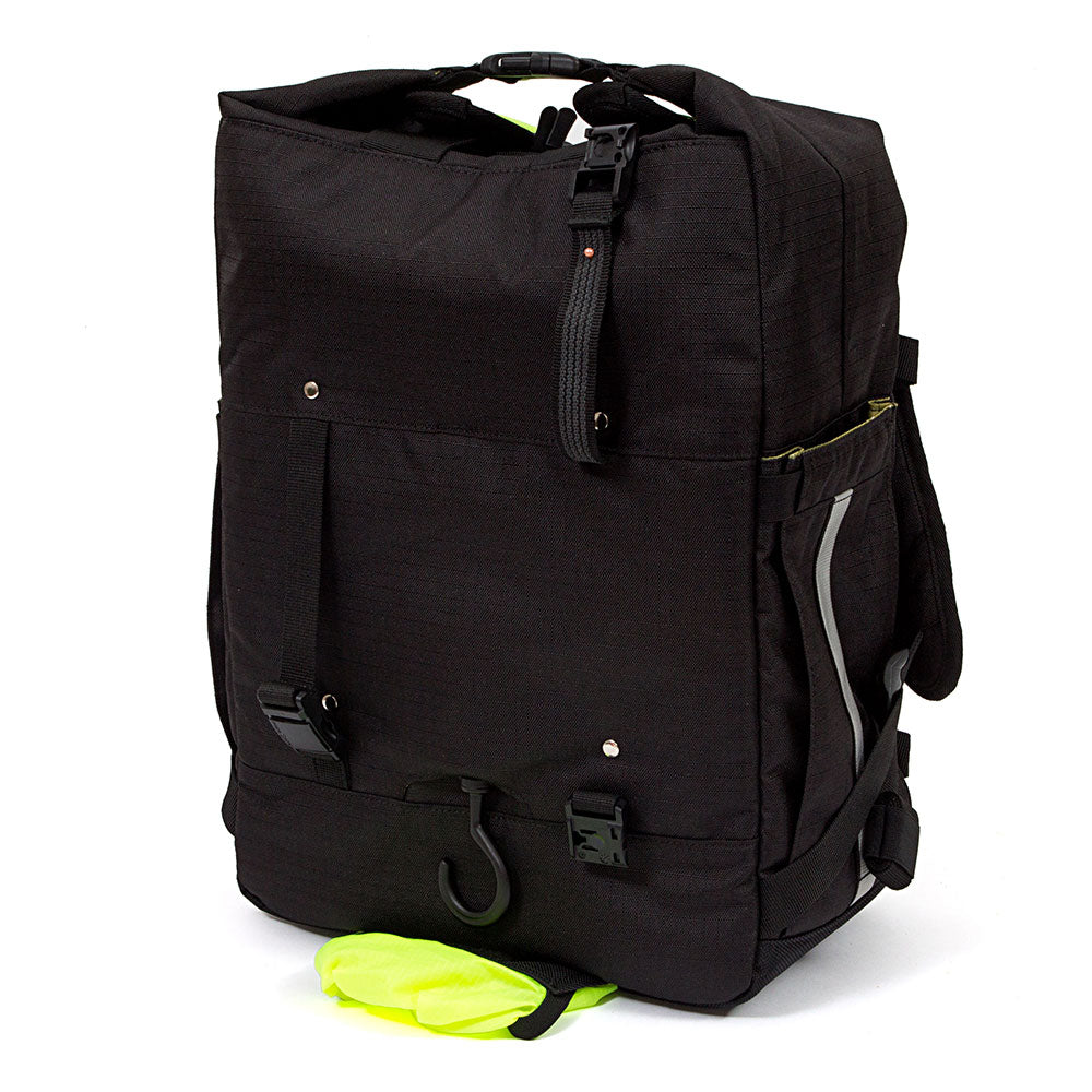 Po Campo black backpack pannier with a yellow rain cover on a white background