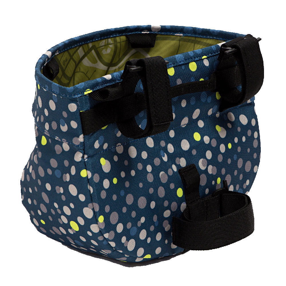 Blue polka dot bicycle bag with black straps on a white background