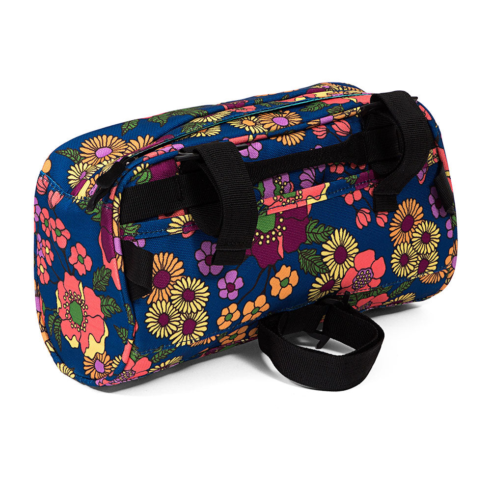 Floral-patterned handlebar bag on a white background