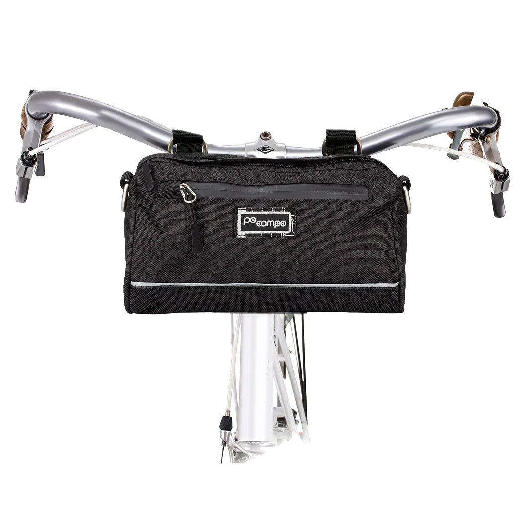 Black bicycle handlebar bag with a Po Campo logo on a white background