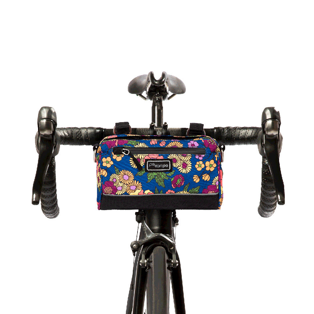 Floral-patterned bicycle handlebar bag on a white background