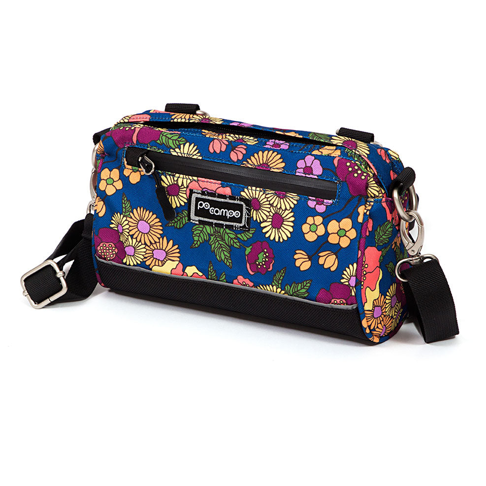Floral-patterned handlebar bag with a visible Po Campo logo on a white background