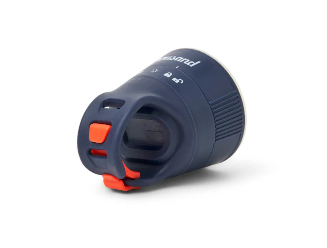Blue and orange bike light on a white background