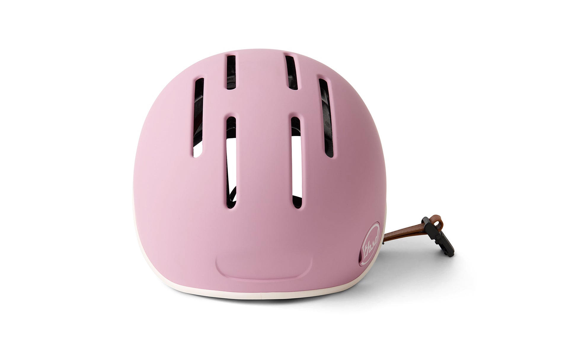 Pink helmet with a brown strap on a white background