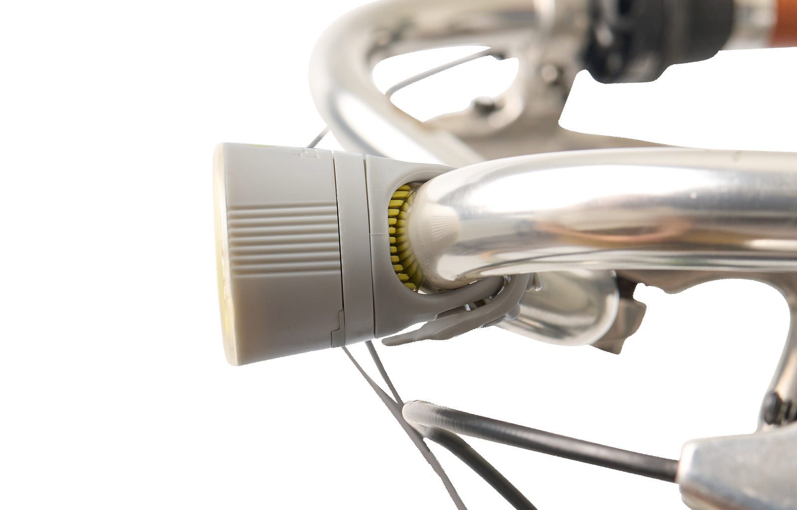 Close-up of a bicycle front light with a white background