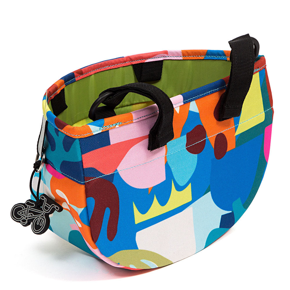 Colorful handlebar bag with abstract pattern on a white background