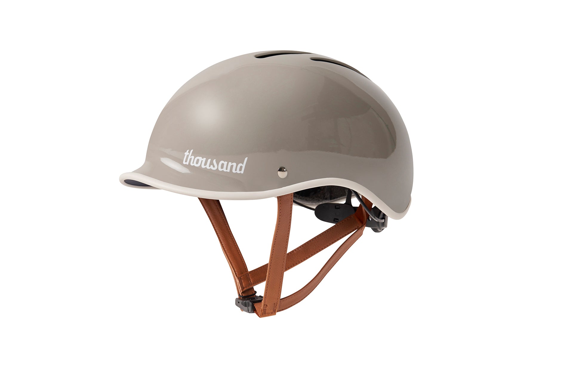 Dove grey helmet with 'thousand' branding on a white background