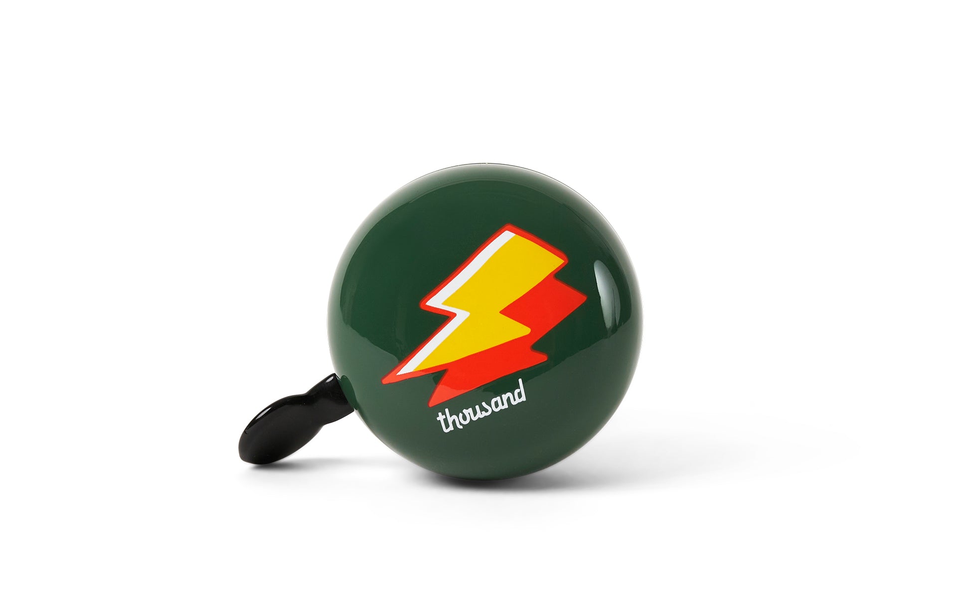 Green bicycle bell with a red and yellow lightning bolt design on a white background
