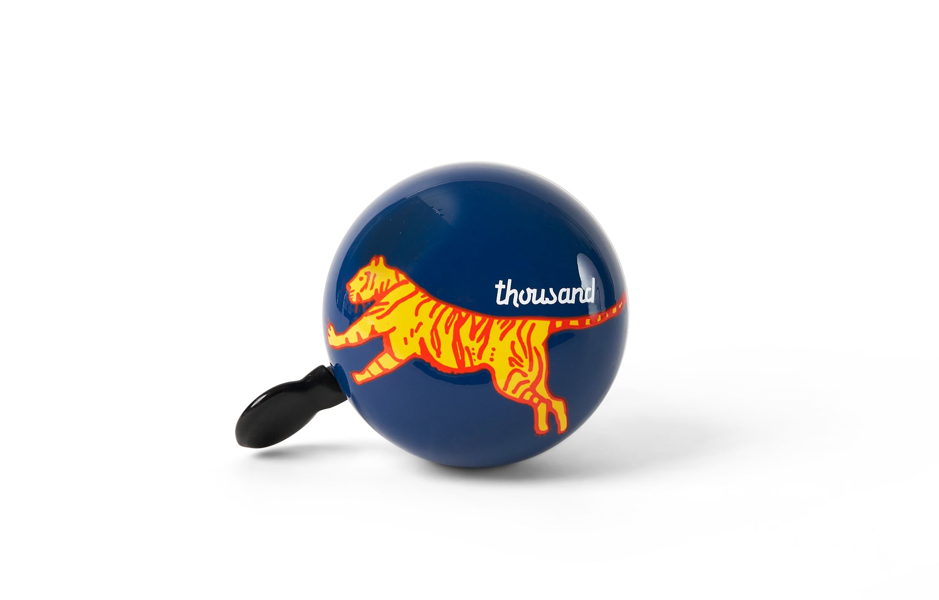 Bicycle bell with tiger design and 'thousand' branding on a white background