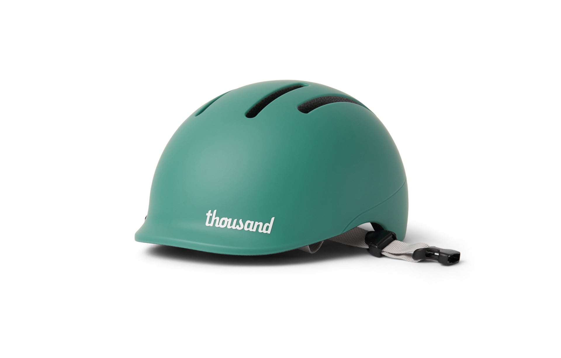 Green helmet with 'thousand' branding on a white background