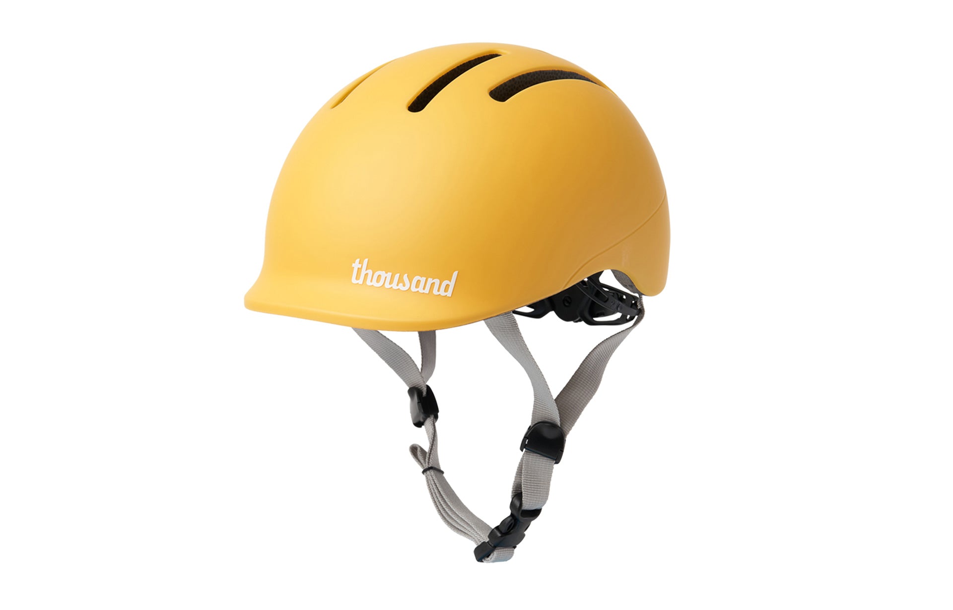 Yellow helmet with 'thousand' branding on a white background