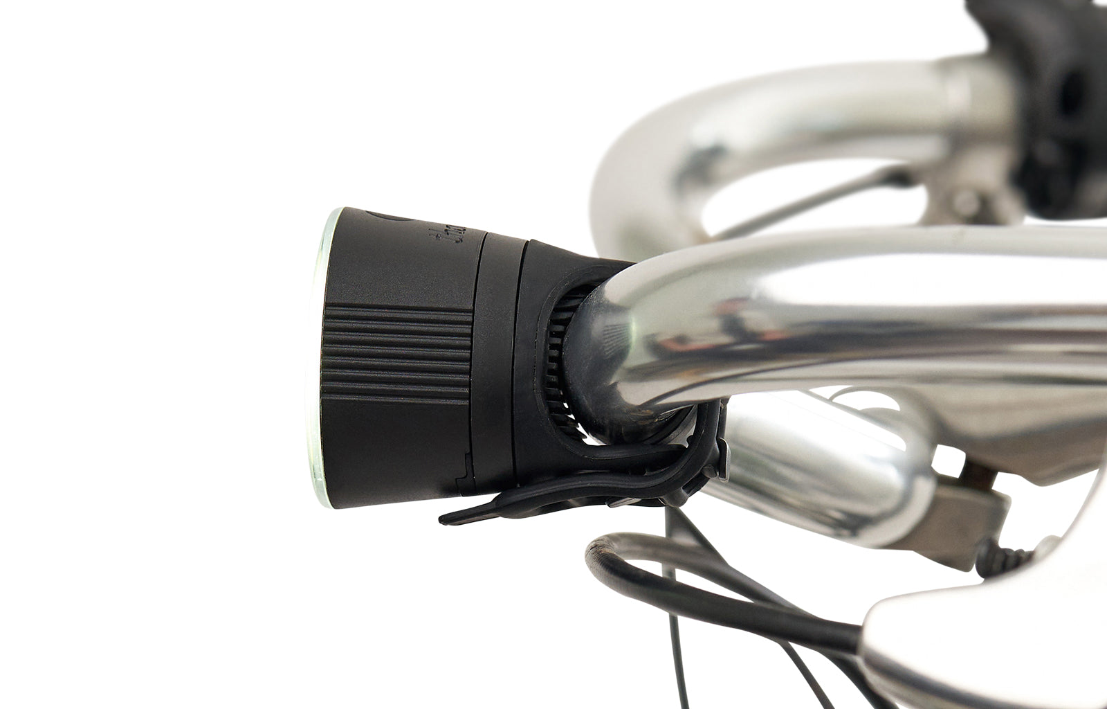 Close-up of a detachable bicycle front light on a white background