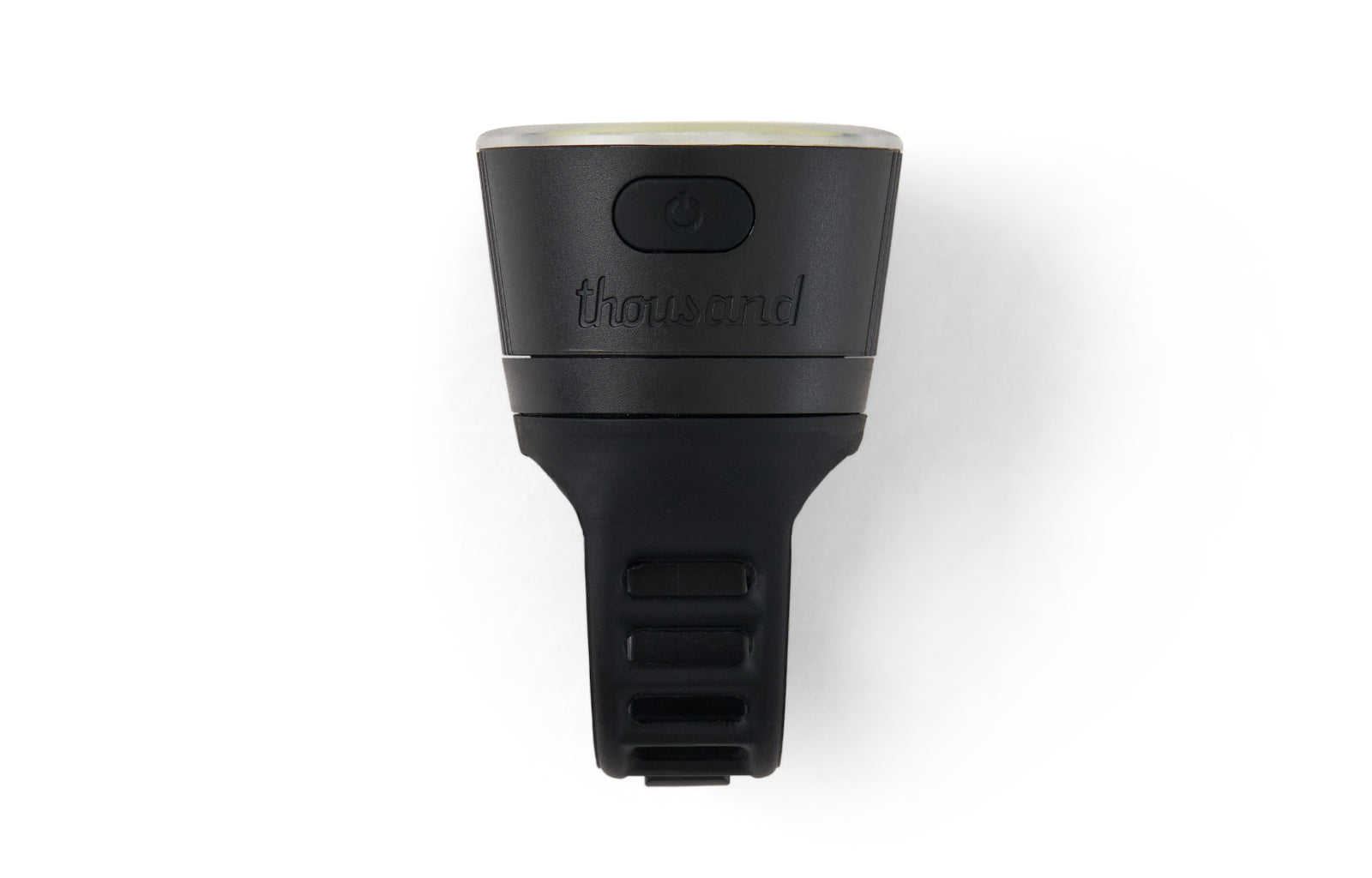 Black bike detachable light with 'thousand' branding on a white background