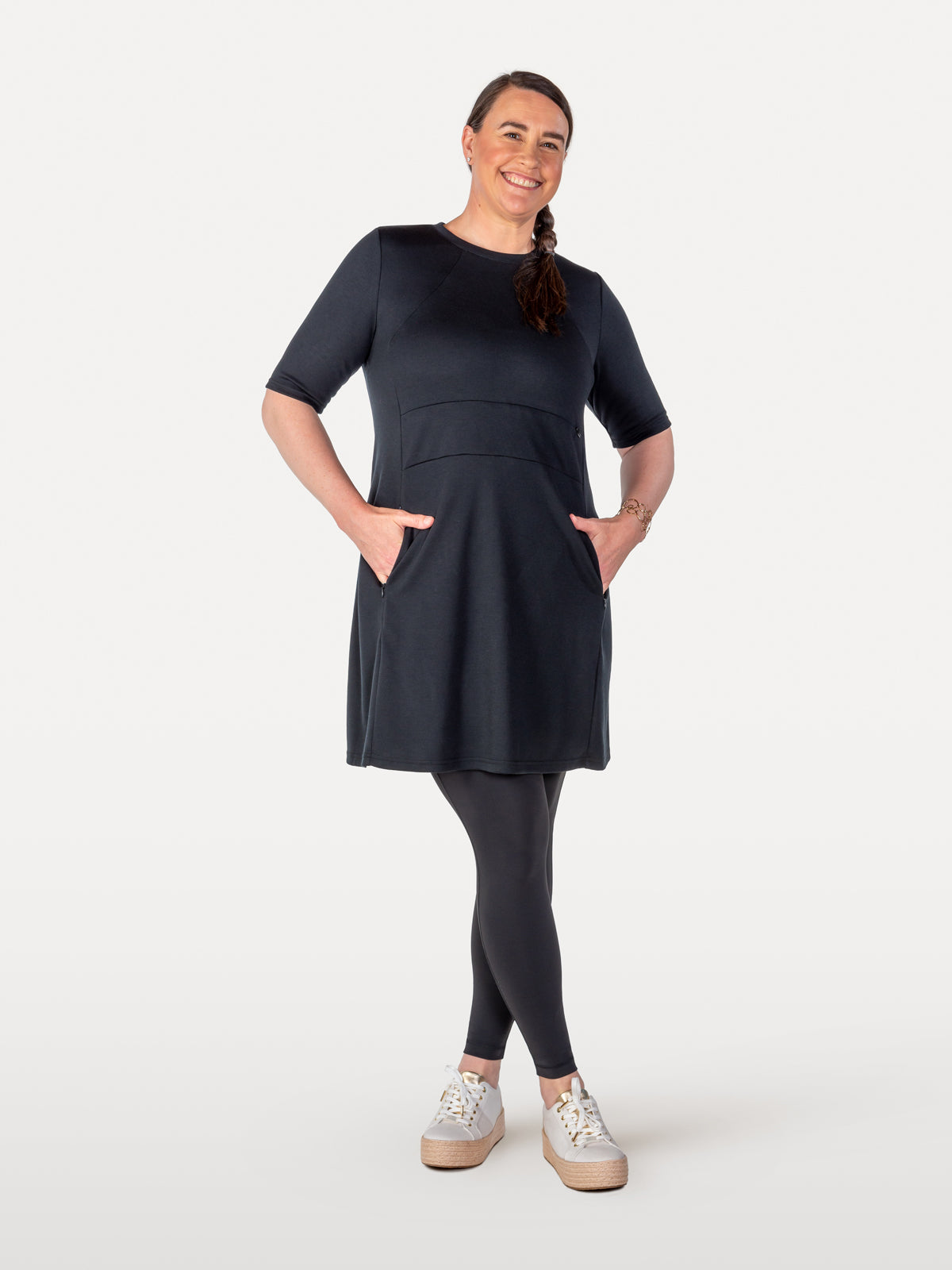 Universal black cycling dress over black leggings with side pockets