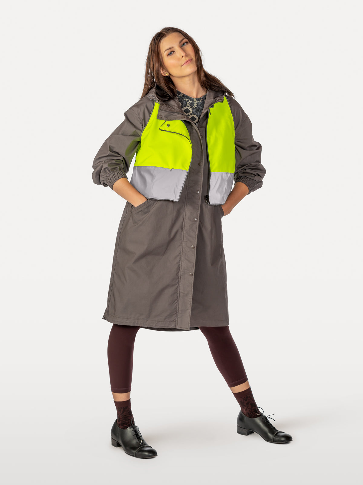 Daisy pattern cycling dress over leggings and under overcoat with reflective dragonfly vest