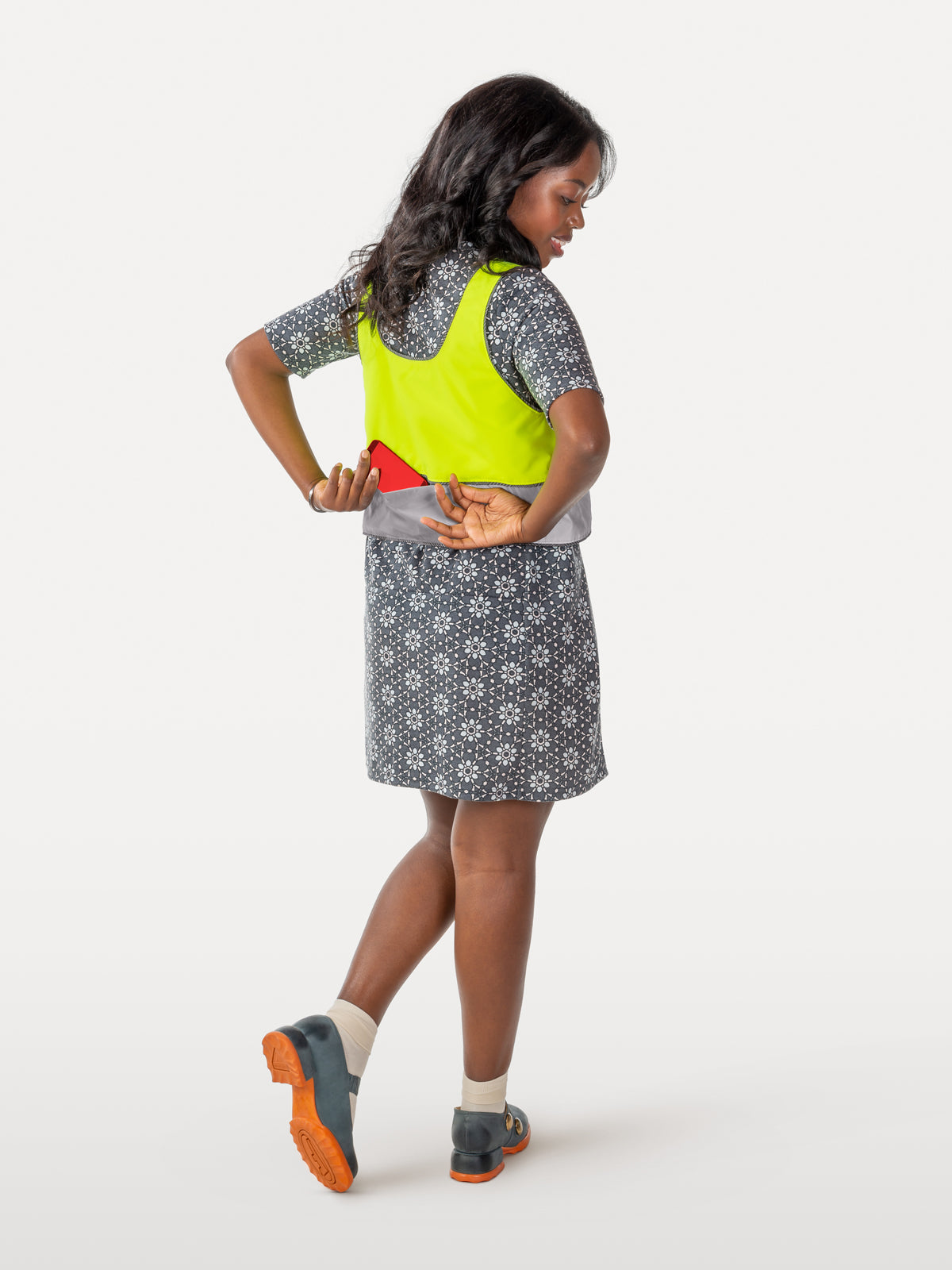 View of high visibility crisscross vest showing back pocket